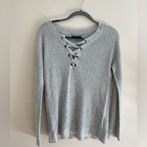 Grey knit sweater with corset scoop neck